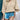 Beige batwing blouse for women with a casual chic style, featuring a V-neck design suitable for summer wear. The blouse is paired with shorts, showcasing a fashionable and relaxed look.
