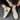 Beige striped men's fashion sneakers, trendy lace-up canvas shoes, showcased on a human model highlighting the footwear's design and material.