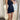Beige sleeveless V-neck romper for women featuring a stylish belt around the waist, perfect for summer fashion.