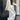 Beige women's loungewear tracksuit made from a comfortable cotton blend, featuring long sleeves and a relaxed fit, ideal for lounging.