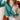 Bi-color women's sweater featuring a green and cream two-tone design. The sweater is winter knit with long sleeves, shoulder detail, and a rounded neck.