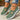 Purple slip-on mesh sneakers for women on a white background, featuring a breathable design with a modern and stylish look, suitable for casual wear.