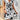 Black and white floral skater dress, sleeveless, A-line summer outfit, showcasing a stylish fashion design with a fitted bodice and flared skirt.