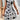 A black and white sleeveless floral skater dress with an A-line silhouette, designed for summer wear, showcasing a stylish and fashionable day dress look.