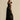 Black floral sheer one-shoulder evening dress showcasing an elegant design with sheer fabric, a fitted waist, and asymmetrical neckline, ideal for formal occasions.