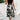 Elegant black sleeveless midi dress with floral pattern, perfect for summer formal events, showcasing a fitted waist and a stylish neckline.