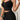 Women's summer two-piece set featuring a black ribbed crop top with lace trim shorts, modeled by a standing woman showing shoulders, waist, and legs.