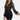 Black sequin party dress featuring a sheer beaded blouse, open back design, and short sleeves.