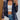 Elegant black sheer floral lace jacket, lightweight, perfect for evening wear, shown in marine blue, XL(42), with stylish jeans and eyewear accessories.