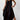 Black sleeveless maxi dress with side pockets and ankle-length design, worn by a woman.
