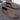 Black textured leather slip-on loafers for men with a decorative zipper, showcasing a sleek and modern design, ideal for a stylish and comfortable dress shoe option.