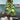 A person wearing a bold graphic black and white geometric maxi dress stands outdoors, showcasing the beach cover-up style in a natural setting.