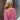 A woman wearing a blue floral midi dress with a V-neck and long sleeves, ideal for fall fashion.