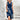 Blue floral V-neck wrap midi dress featuring short sleeves, fitted waist, and a flowy skirt, suitable for summer party wear.