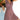 Woman wearing Blue White Geometric V-Neck Sleeveless A-Line Summer Dress, smiling with her hand on her hip.