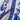 Blue and white porcelain print long sleeve floral dress with belt, featuring intricate patterns and a collared neckline.