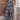 Bohemian Ethnic Print Wide-Leg Summer Jumpsuit in blue and purple tones, featuring a one-piece design with short sleeves, a defined waist, and a wide-legged silhouette.