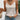 Bohemian floral lace tank top with tassel tie back for women, featuring delicate lace detailing, designed for summer wear. The top is sleeveless, with a focus on the neckline and shoulder area. The fabric is lightweight and has a grey hue, offering a breezy and stylish look.