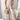 Bohemian Paisley Jumpsuit featuring a strappy open back design and wide-leg cut, highlighting the shoulders and waist while the model is standing.