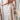 Bohemian Paisley Jumpsuit with strappy open back and wide legs, featuring a paisley pattern, sleeveless design, and a relaxed fit.