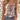 A women's summer blouse featuring a Bohemian paisley design made from a silk blend material. The tank top is sleeveless, showcasing the shoulders and neck, and is styled in a white color. It is paired with jean shorts, highlighting a casual and fashionable look.