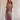 Bohemian V-Neck Tribal Print Kaftan Dress, luxury summer beachwear, featuring a flowy one-piece garment with intricate tribal patterns, V-neckline, and short sleeves, showcased on a model with long hair, wearing shoes.