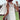Boho-Chic Crochet Back Sundress worn by a woman in a sun hat, standing in a grassy field under a clear sky, showcasing summer festival fashion style.