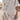 Boho-Chic V-Neck Mini Dress in white, featuring a casual and stylish design with short sleeves, perfect for summer or as a beach cover-up.