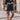 Boho-Chic V-Neck Mini Dress worn by a model, showcasing a lightweight and flowy design with a flattering neckline, short sleeves, and above-the-knee hem, perfect for summer outings or as a beach cover-up.