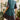 Boho ethnic print V-neck knee-length dress with three-quarter sleeves, featuring a vibrant pattern.
