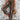 Boho Women's Tribal Print Wide Leg Festival Pants worn by a person, showcasing a colorful tribal pattern and a relaxed wide-leg fit. The image captures parts of the person's legs and hints at a casual, bohemian style suitable for festivals.