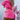 Bright pink women's co-ord outfit featuring a crop top, frayed shorts, and a bomber jacket.