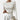 White ribbed twist front crop top blouse with long sleeves, showcased on a model.