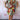 Colorful wave pattern knee-length summer dress with a multicolor V-neck design, featuring short sleeves, modeled by a person with shoulder-length hair, showcasing the fashion-forward, vibrant style.