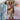 A multicolor knee-length summer dress featuring a vibrant wave pattern, designed with a V-neck and short sleeves. The dress is displayed on a mannequin against a plain background, highlighting its colorful textile and fashion-forward style.