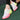 Colorful women's running shoes featuring lightweight and breathable design in shades of pink and magenta, shown on feet, ideal for walking and sportswear.