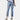 Light wash denim distressed ripped skinny jeans for women, featuring a modern fit and stylish details like distressed patches and a slim silhouette.