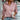 Dusty rose ribbed quarter-zip pullover modeled by a woman, paired with jeans, showcasing women's autumn fashion.