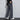 Men's stylish khaki corduroy pants paired with a grey blazer, showcasing a comfortable and fashionable outfit.