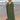 Elegant green V-neck caftan, lightweight and flowy beach dress, worn by a person standing on the beach.