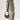 Elegant leather hobo bag in beige, featuring a crescent shape, designed for women with luxury details and a shoulder strap.