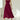 Elegant teal midi dress in a sleeveless, fit and flare style, ideal for formal events, showcasing the shoulder and arm details against a neutral background.