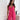 Elegant white sleeveless V-neck belted formal jumpsuit for women with a fitted waist and chic design.