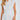 Elegant women's black sleeveless belted jumpsuit displayed on a mannequin or model, highlighting the formal and chic design with a focus on the waist and shoulder areas.