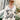 Elegant women's botanical print maxi robe featuring luxurious spa wear design, showcasing intricate plant patterns on a flowing white fabric. The robe has long sleeves and is worn by a woman with a relaxed facial expression, highlighting the spa-like comfort and style.