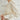 Elegant women's high-waist trouser suit and pleated blouse set in beige, featuring tailored outerwear, a structured shoulder design, long sleeves, and a defined waist, styled with a dress shirt neckline.