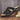 Blue embroidered floral women's sandals, comfortable summer slides on a beige background.