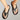 Black ergonomic flip flops with arch support, showcasing a lightweight and durable design, worn on a human foot.