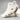 Men's white high-top designer sneakers styled for urban streetwear, featuring a sleek and modern design ideal for outdoor activities and walking.