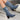 Floral blue denim ankle boots for women featuring a stylish block and high heel design, showcasing an electric blue shade.